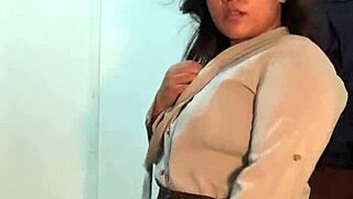 Asian woman performs strip tease