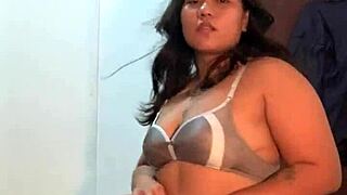 Asian woman performs strip tease