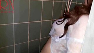 Caught a housewife under the shower, wet panties and shirt clinging tight on hidden cam