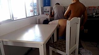 Hey, watch this naughty wife bang a hung guy while her cuckold husband washes dishes in the kitchen. What a wild scene!