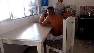 Hey, watch this naughty wife bang a hung guy while her cuckold husband washes dishes in the kitchen. What a wild scene!