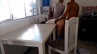 Hey, watch this naughty wife bang a hung guy while her cuckold husband washes dishes in the kitchen. What a wild scene!