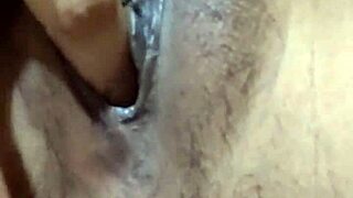 Indonesian girl teases tight pussy with slow finger play