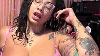 ebony woman with big tits and brown eyes enjoys softcore tongue play on feet