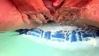 Descriptive Underwater Creampie with Dildo in Shaved Babe's Pussy Close Up