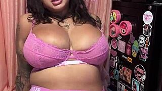 ebony woman with big tits and brown eyes enjoys softcore tongue play on feet