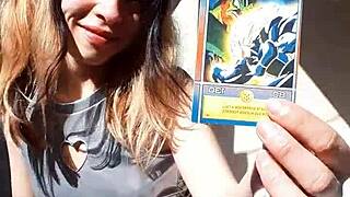 Bonneyuwu Shows Off Her Body in Cosplay While Displaying Cards Outdoors.