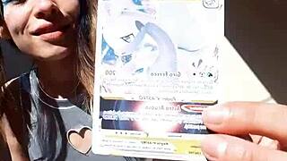 Bonneyuwu Shows Off Her Body in Cosplay While Displaying Cards Outdoors.