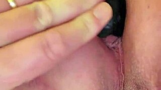 an amateur gets sodomized with an anal plug.