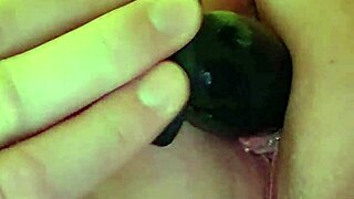 an amateur gets sodomized with an anal plug.