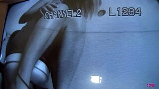 busty dana with tattoos sucks the big cock from the glory hole, giving a handjob too.