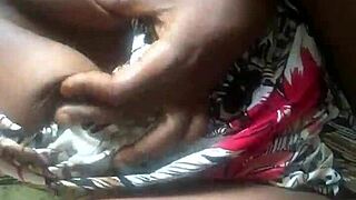 Black amateur talks dirty while showing small tits and pussy in homemade video