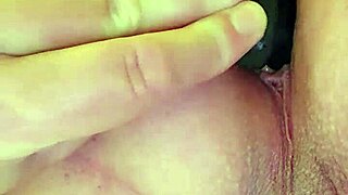an amateur gets sodomized with an anal plug.