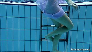 Aneta’s massive tits in that purple dress, soaking wet in the pool!