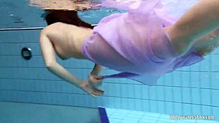 Aneta’s massive tits in that purple dress, soaking wet in the pool!