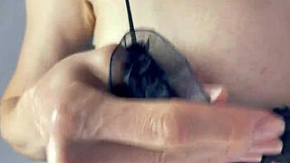 Oily babe jerks big cock and gets cum on tits in POV.