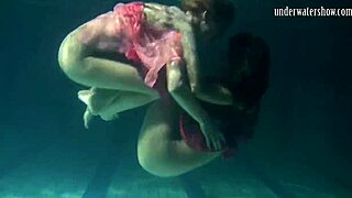 Lilia and Natalia bathing underwater