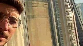 Casal bangs hard by the window for neighbors to watch