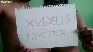 a couple records their verification video in a casual setting