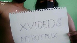 a couple records their verification video in a casual setting