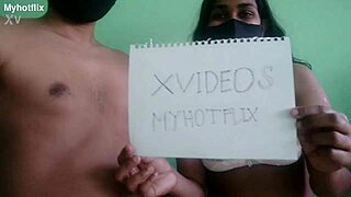 a couple records their verification video in a casual setting