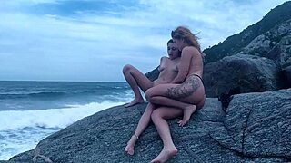 Brazilian Amateur Poses with Small Tits on Rocks