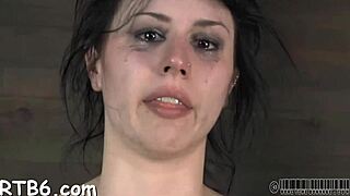 Tell me, how does this bound babe handle rough bondage sex?