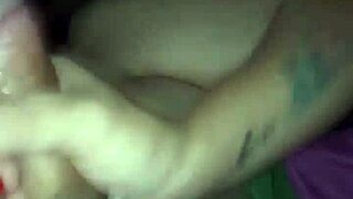 She massages my dick while watching porn until milking it all