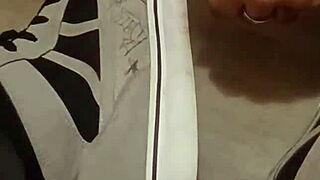 friend trashing sneakers in fun fetish way