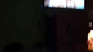 She massages my dick while watching porn until milking it all