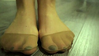 Girl playfully interacts with balloons in stockings