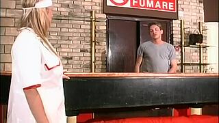 Three men assist the nurse