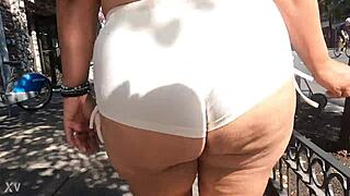 Milf Flashes Ass in Mini Shorts While Walking Public Streets