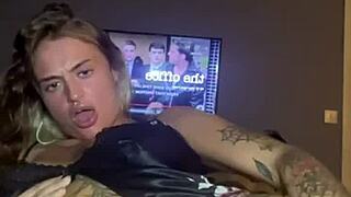 The teen goth whore spreads her legs and fucks her tight pussy