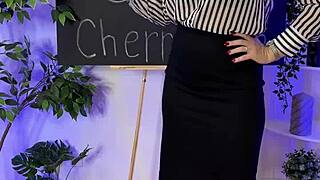 Wow, this mature teacher in sheer brown pantyhose is pure fire! 🔥