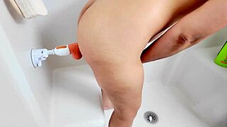 I caught my wife masturbating in the shower with her big dildo