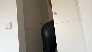She moans while masturbating in latex, craving anal fucking