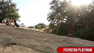 Samantha Rone and Mindi Mink tend to the garden together.