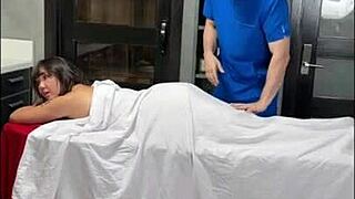 Asian college girl receives relaxing oil massage