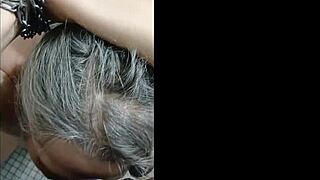 female slave in bondage gets facial in highway toilets