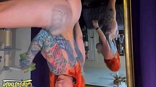 Hypnotic Stripper Seduces with Tattooed Curves