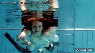 I'm the hot Hungarian teen Petra in the pool, hairless and shaved for underwater fun. Big tits bouncing.