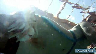 I'm the hot Hungarian teen Petra in the pool, hairless and shaved for underwater fun. Big tits bouncing.