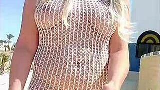 Transparent dress without underwear on a young blonde flashing her ass in public.