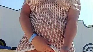 Transparent dress without underwear on a young blonde flashing her ass in public.