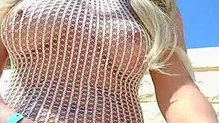 Transparent dress without underwear on a young blonde flashing her ass in public.