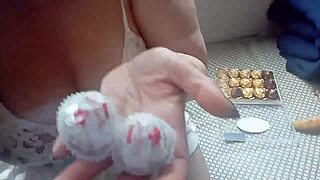 ginger paris masturbates sensually with chocolates in lingerie, feeling pleasure in her big tits and ass