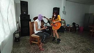 music teacher interacts with student in class