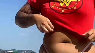 African Woman Gets Tattoo on Beach, Excites Guy Who Asks to See Her Big Pussy