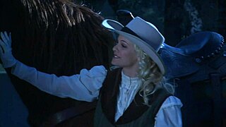 brooke ballentyne gets cozy with a ranch hand outdoors by the fire